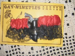 GAY-NINETIES WORLD'S FAIR SOUVENIR RED SATIN GARTER, 3'' GUN
